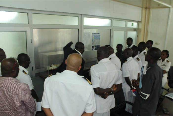 DOP, Mr. Thomas Manu (in black jacket) here explains some techinical details of the FPSO Kwame Nkrumah. - Copy