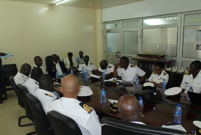 DOP, Mr. Thomas Manu (in black jacket) lecturing the Navy Students on the operations of GNPC